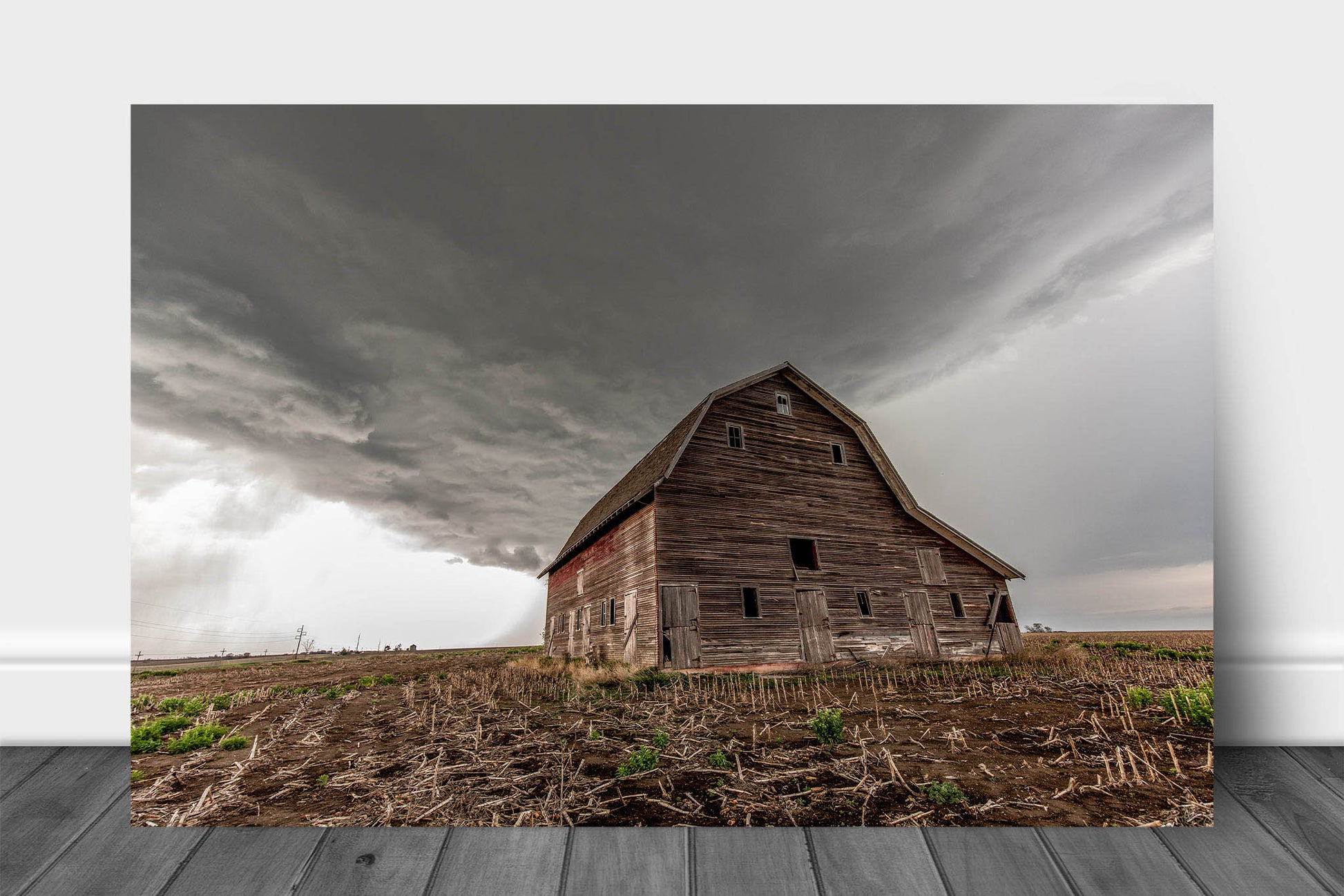 Country aluminum metal print of a storm advancing over an old red Amish style barn in a field on a stormy spring day in Nebraska by Sean Ramsey of Southern Plains Photography.
