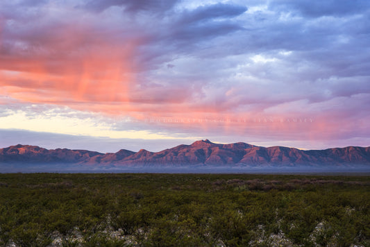 Western landscape photography print of sunlit clouds over the Del Norte-Santiago Mountains at sunrise in the Big Bend region of West Texas by Sean Ramsey of Southern Plains Photography.