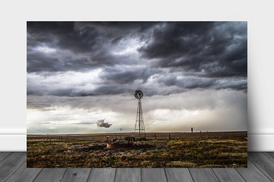 Country aluminum metal print wall art of an old windmill underneath a stormy sky on a spring day in the Oklahoma panhandle by Sean Ramsey of Southern Plains Photography.