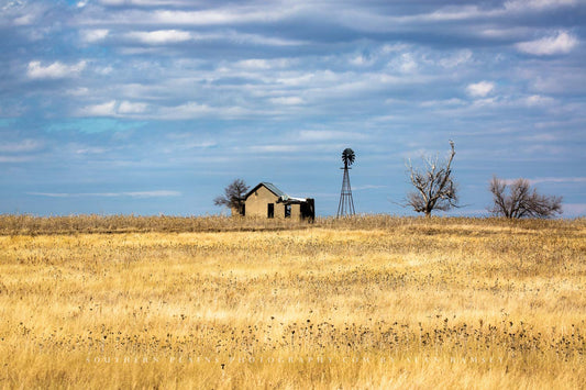 Country photography print of an abandoned homestead and old windmill on a rise in a field of golden prairie grass on a winter day in Oklahoma by Sean Ramsey of Southern Plains Photography. 