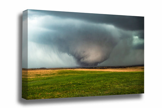 Storm canvas wall art of a large tornado rumbling over open plains on a stormy spring day in Kansas by Sean Ramsey of Southern Plains Photography.