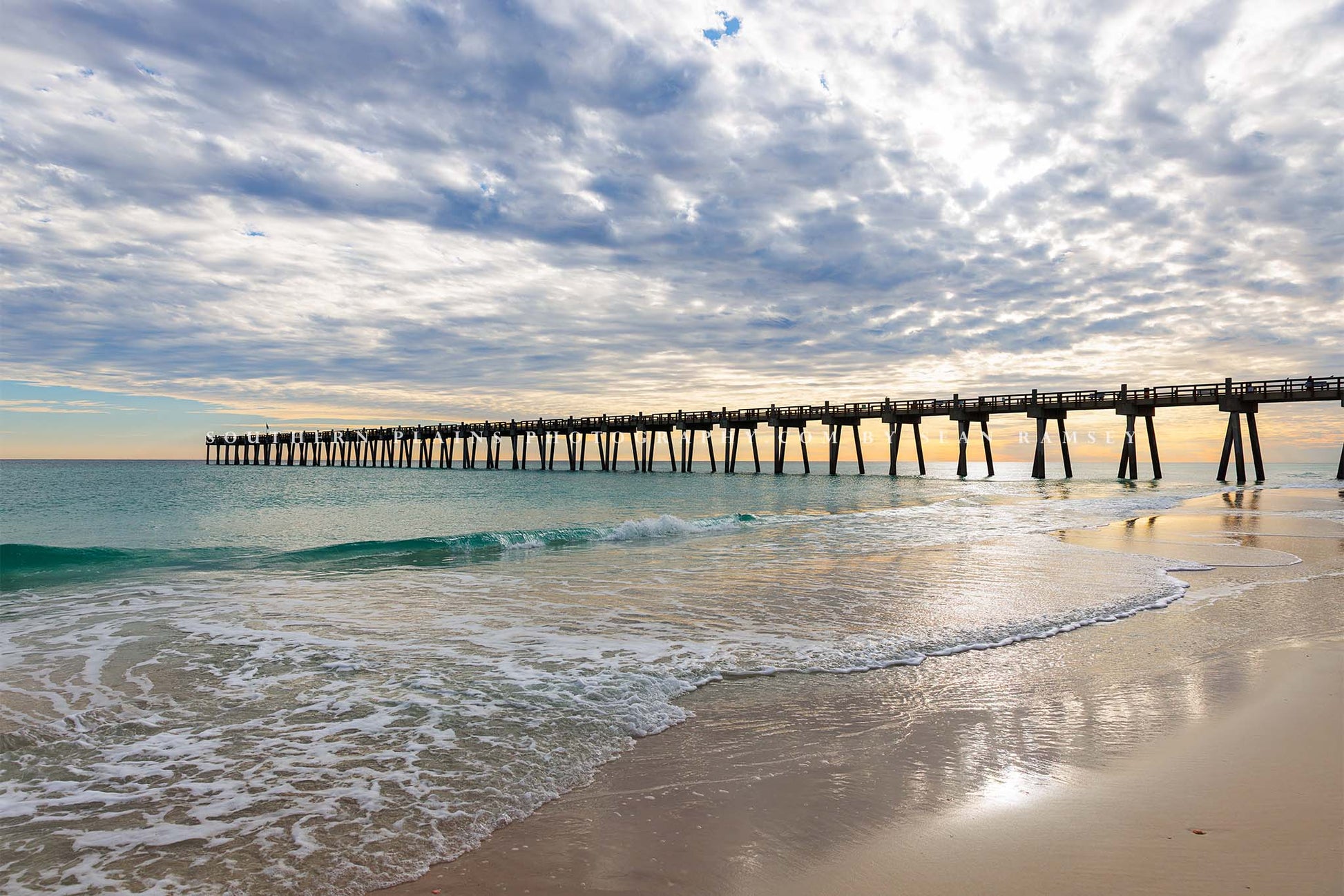 Gulf Coast photography print of the Pensacola Beach Pier over emerald waters on an evening in Florida by Sean Ramsey of Southern Plains Photography.