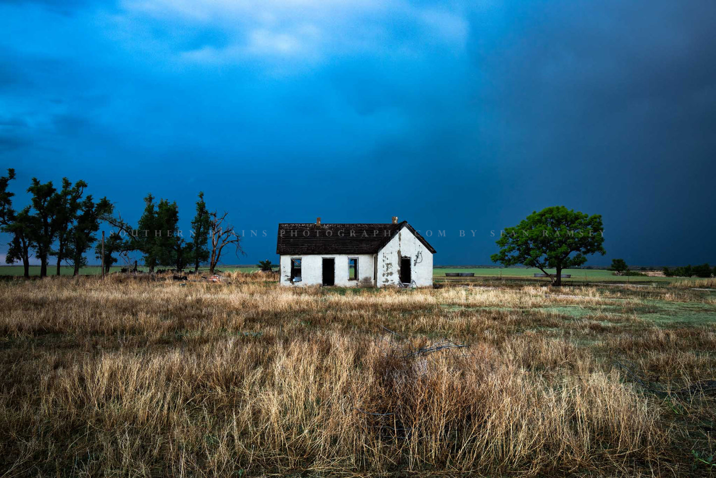 Abandoned photography print of an old house standing out in the brush on a stormy evening in Oklahoma by Sean Ramsey of Southern Plains Photography.
