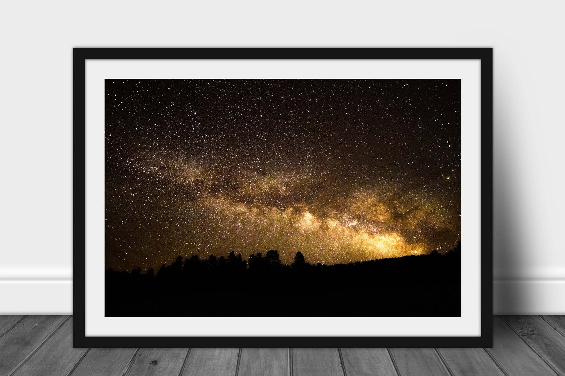 Framed night sky print of the Milky Way rising above pine tree silhouettes on a starry night in the Rocky Mountains of Colorado by Sean Ramsey of Southern Plains Photography.