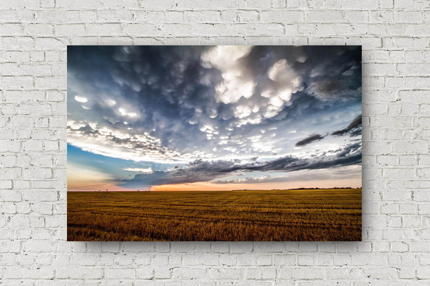 Scenic America metal print wall art of a spacious sky over a field at sunset after a stormy day in Texas by Sean Ramsey of Southern Plains Photography.