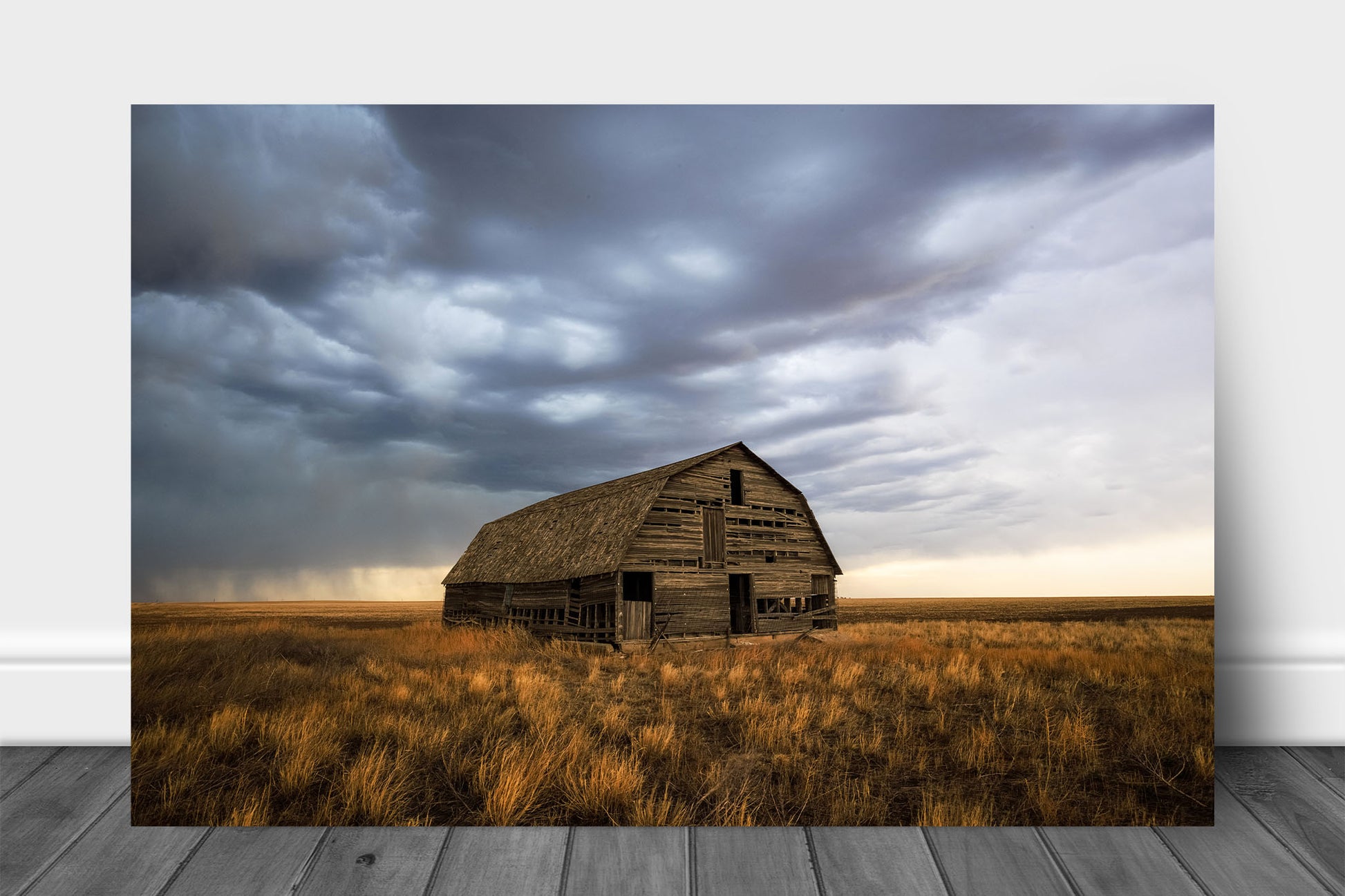 Great plains aluminum metal print wall art of an old wooden barn standing alone in prairie grass under a stormy sky in Oklahoma by Sean Ramsey of Southern Plains Photography.