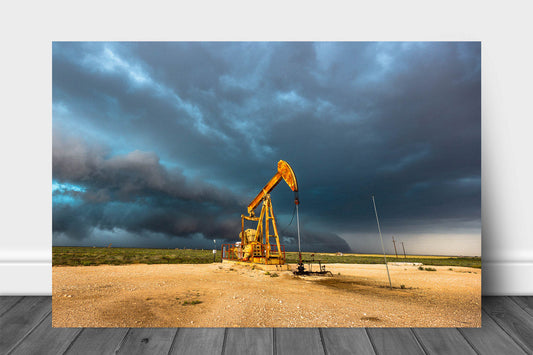 Oilfield metal print wall art on aluminum of a rusty pump jack and thunderstorm on a stormy day in the Permian Basin in West Texas by Sean Ramsey of Southern Plains Photography.