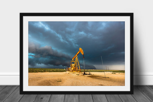 Framed and matted oilfield print of a rusty pump jack and thunderstorm on a stormy day in the Permian Basin in West Texas by Sean Ramsey of Southern Plains Photography.