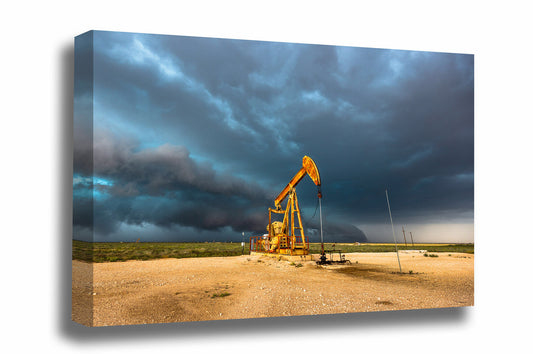 Oilfield canvas wall art of a rusty pump jack and thunderstorm on a stormy day in the Permian Basin in West Texas by Sean Ramsey of Southern Plains Photography.