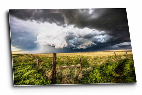 Storm metal print on aluminum of a supercell thunderstorm over a barbed wire fence advancing to open prairie on the plains of Colorado by Sean Ramsey of Southern Plains photography.