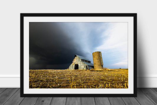 Framed and matted country print of a storm approaching an old barn and grain silo on a stormy spring day in Kansas by Sean Ramsey of Southern Plains Photography.