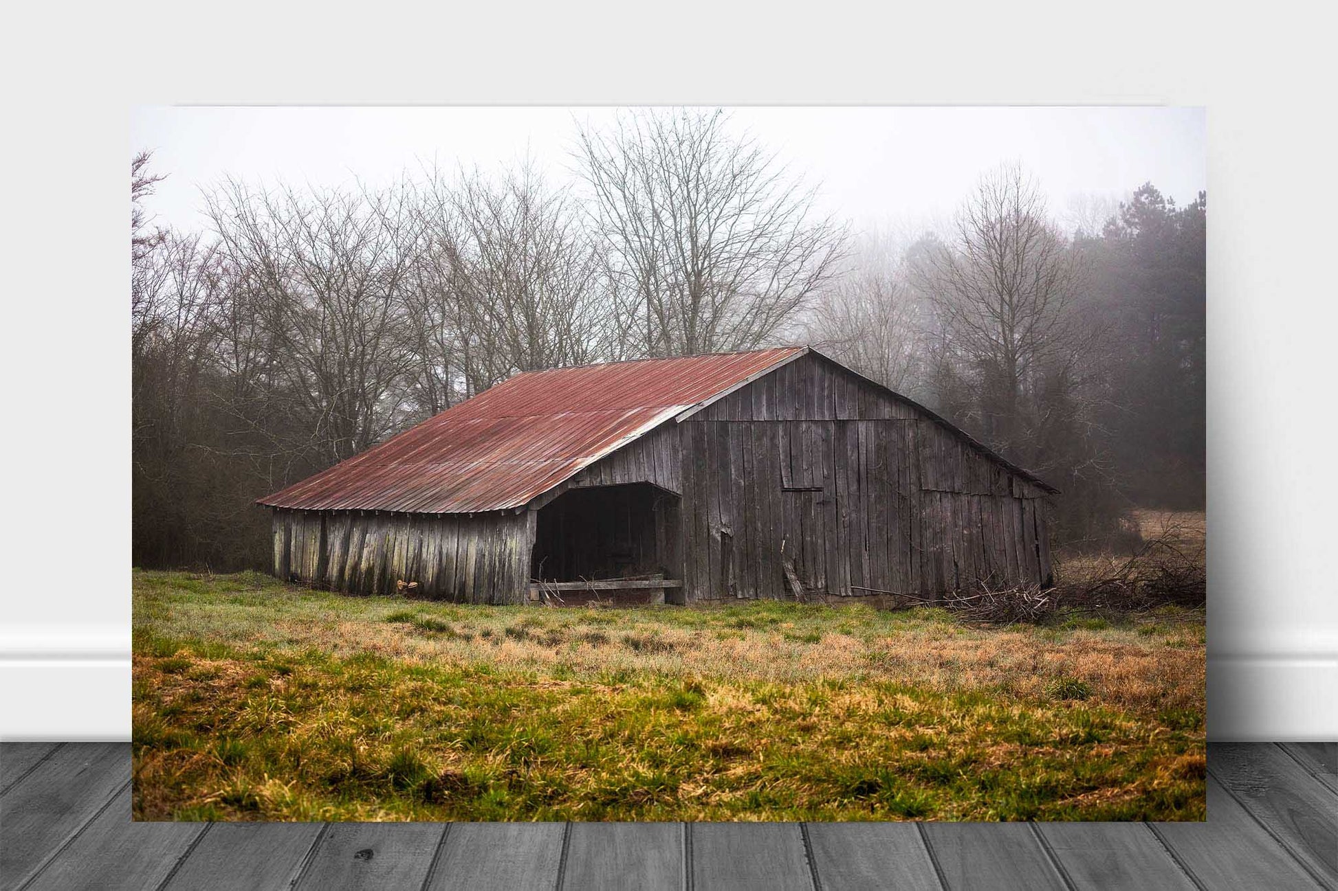 Country metal print wall art of an old wooden barn with a rusted tin roof on a foggy spring day in Arkansas by Sean Ramsey of Southern Plains Photography.