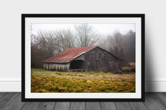 Framed and matted country print of a rustic barn with rusted tin roof shrouded in fog on an early spring day in Arkansas by Sean Ramsey of Southern Plains Photography.