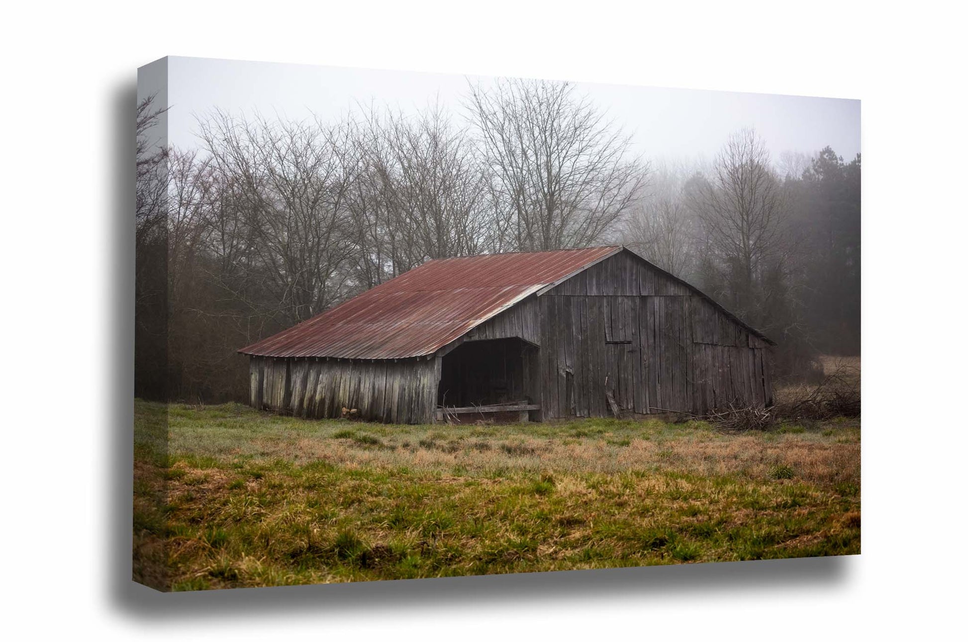 Country canvas wall art of an old wooden barn with a rusted tin roof on a foggy spring day in Arkansas by Sean Ramsey of Southern Plains Photography.