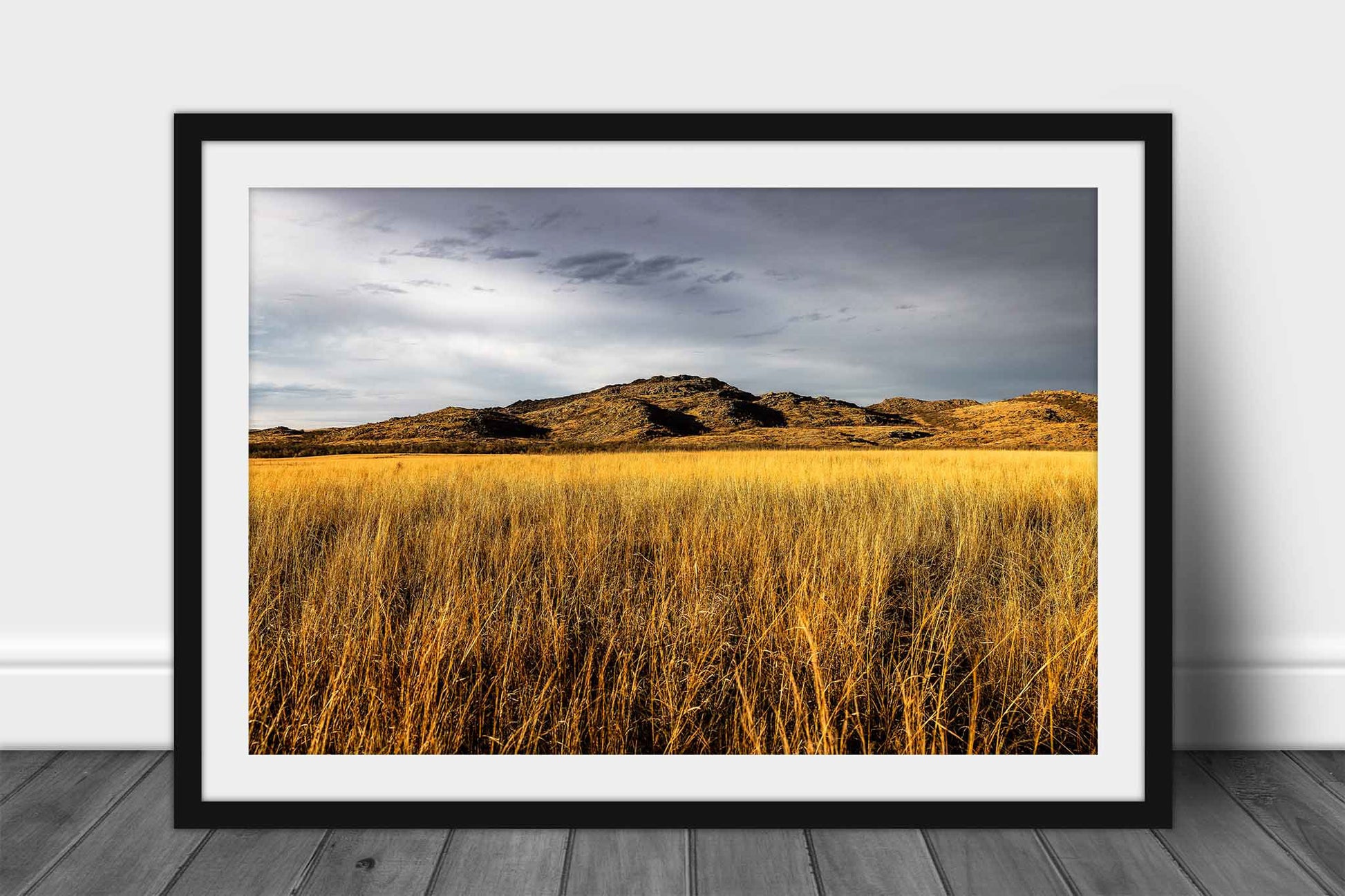 Framed and matted Wichita Mountains print of a stone mountain overlooking golden prairie grass on an autumn day at the Wichita Mountains Wildlife Refuge in southwest Oklahoma by Sean Ramsey of Southern Plains Photography.