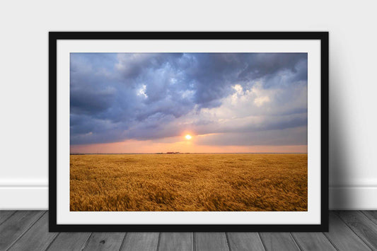 Framed and matted country print of the sun breaking through storm clouds over a golden wheat field at sunset in Oklahoma by Sean Ramsey of Southern Plains Photography.