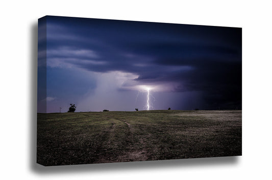Storm canvas wall art of a branched lightning bolt striking open prairie on a stormy night in Oklahoma by Sean Ramsey of Southern Plains Photography.