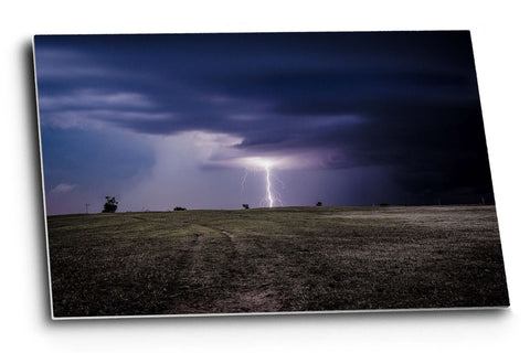 Storm metal print on aluminum of a lightning bolt striking on a dark and stormy night on the plains of Oklahoma by Sean Ramsey of Southern Plains Photography.