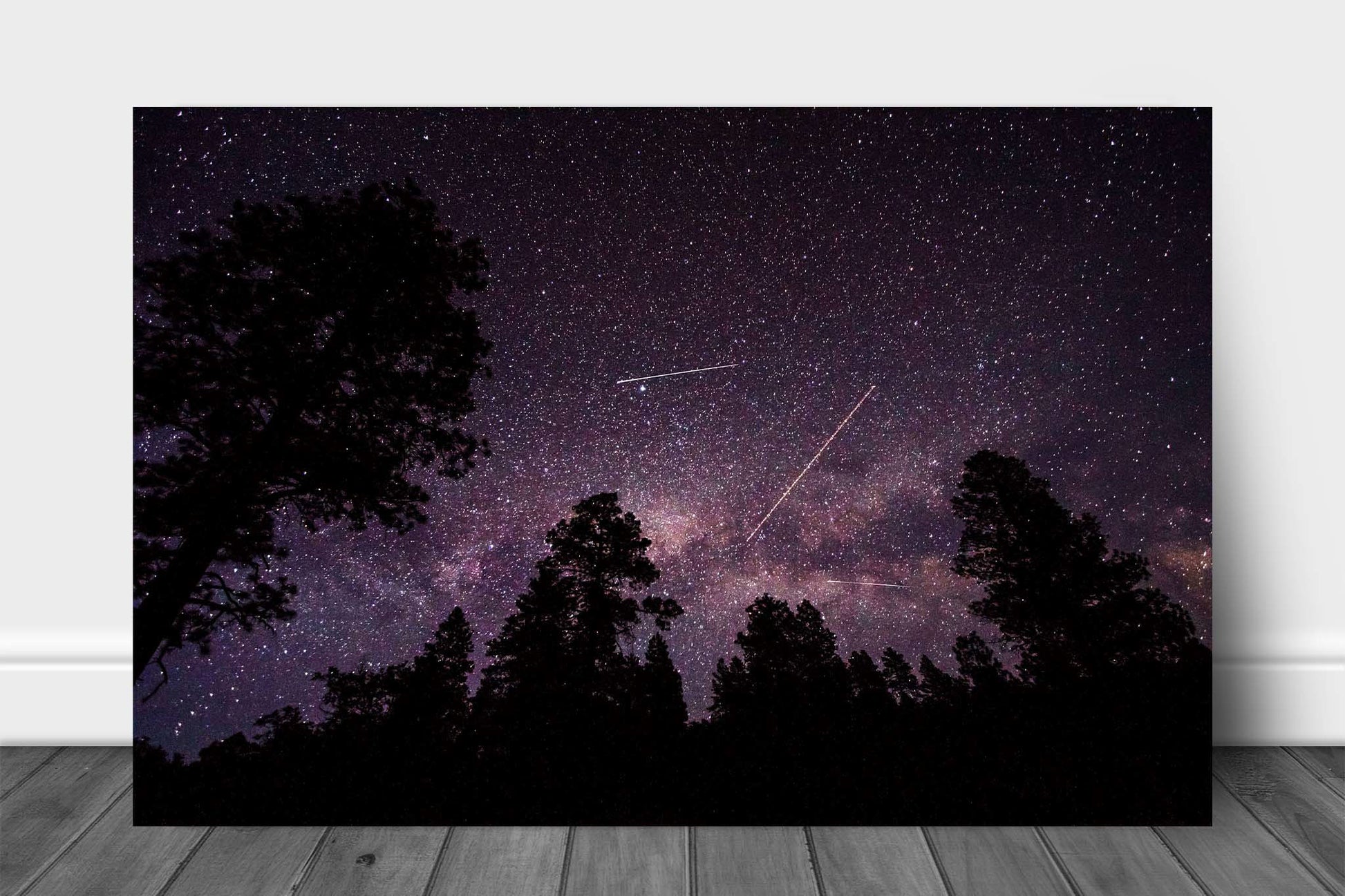 Celestial metal print of shooting stars, planes and satellites crossing the night sky in front of the Milky Way on a clear night in the Rocky Mountains of Colorado by Sean Ramsey of Southern Plains Photography.