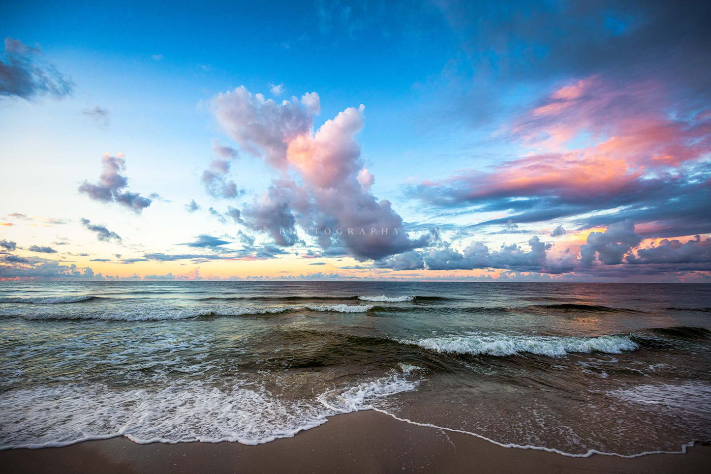 Coastal photography print of a scenic sky over the Gulf of Mexico as waves roll ashore along the Gulf Coast at Orange Beach, Alabama by Sean Ramsey of Southern Plains Photography.