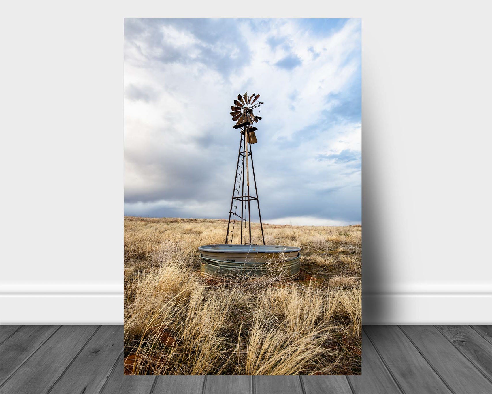 Country aluminum metal print wall art of an old windmill and water tank in golden prairie grass on an early spring day in Oklahoma by Sean Ramsey of Southern Plains Photography.
