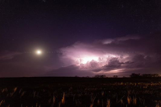 Night sky photography print of the moon and a supercell thunderstorm illuminated by lightning on a starry night in Oklahoma by Sean Ramsey of Southern Plains Photography.