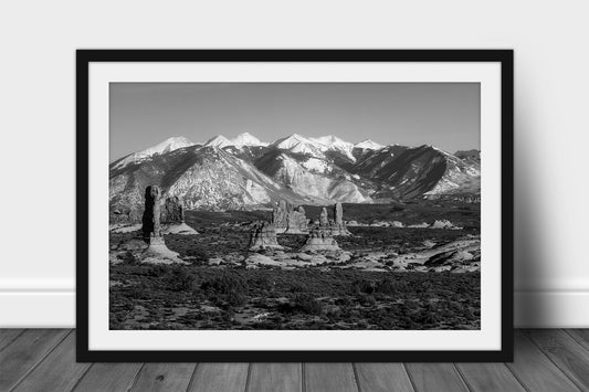 Black and White Rocky Mountains framed print of the La Sal Mountains overlooking hoodoos in Arches National Park near Moab, Utah by Sean Ramsey of Southern Plains Photography.