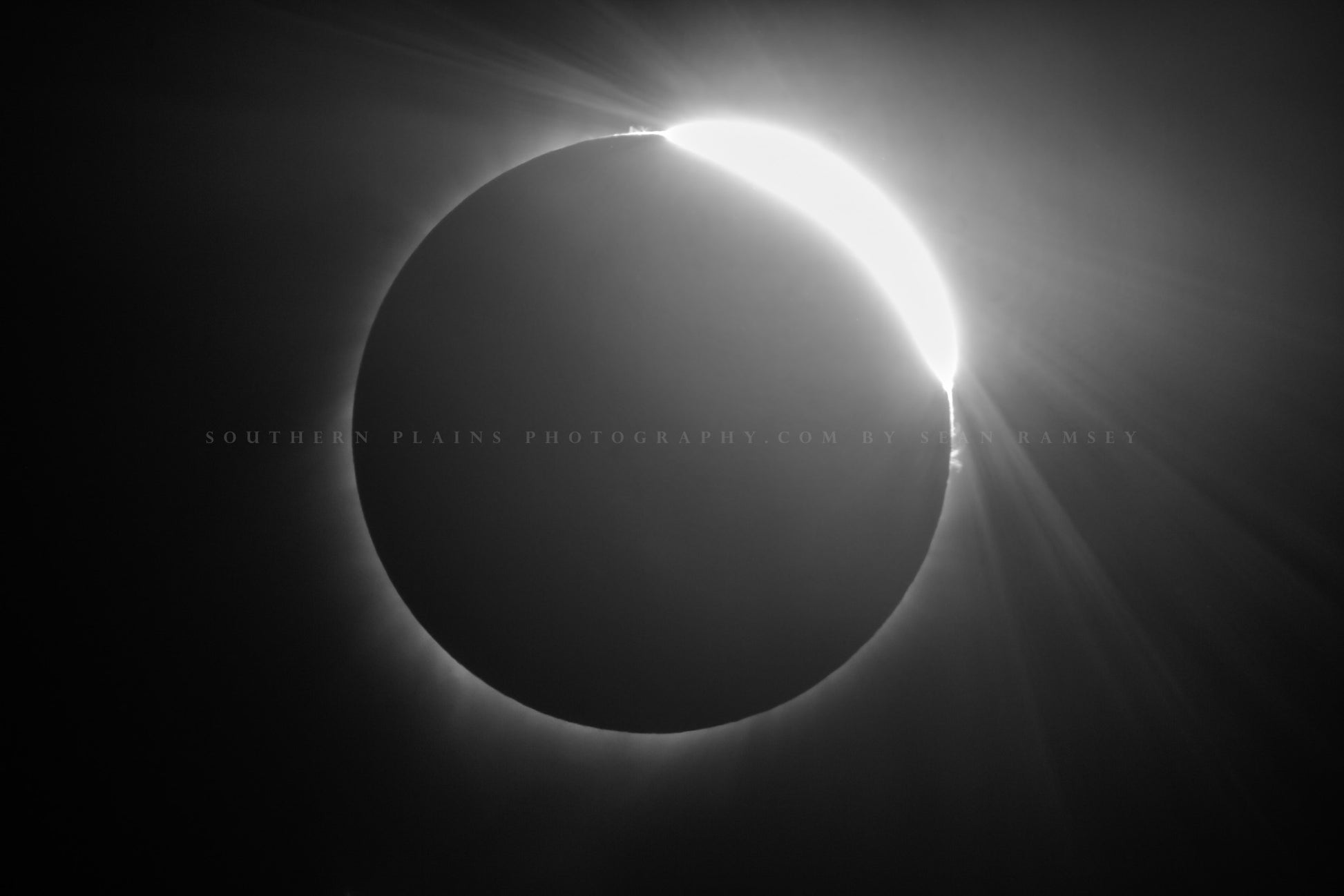 Celestial photography print of a total solar eclipse with the diamond ring effect as it exits totality in the Nebraska sky by Sean Ramsey of Southern Plains Photography.