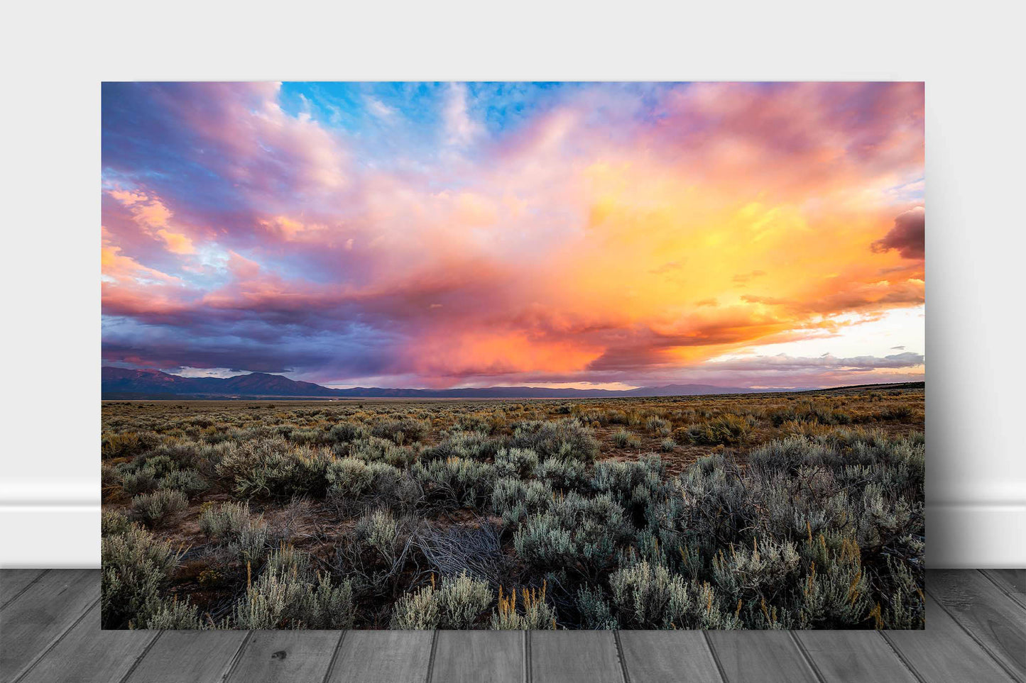Rocky Mountain aluminum metal print of colorful storm clouds over sagebrush on an autumn evening near Taos, New Mexico by Sean Ramsey of Southern Plains Photography.