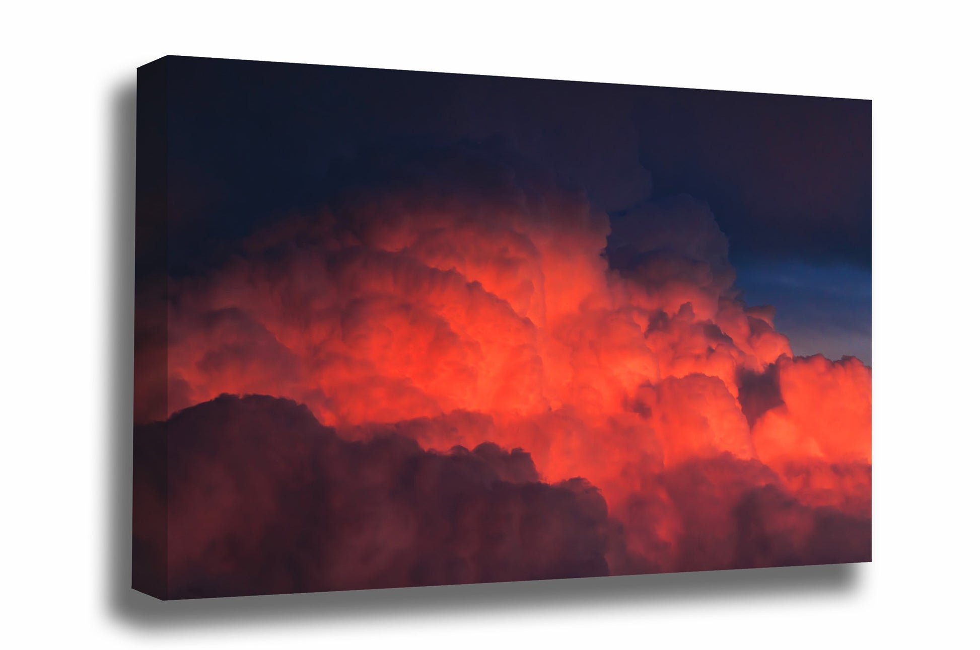 Stormy sky gallery wrapped canvas wall art of fiery red cumulonimbus storm clouds rising high into the sky at sunset on a stormy evening in Texas by Sean Ramsey of Southern Plains 
