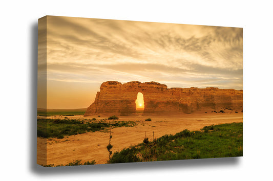 Great Plains gallery wrapped canvas wall art of the sun setting through an opening on a stormy evening at Monument Rocks in Kansas by Sean Ramsey of Southern Plains Photography.