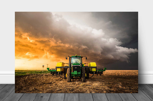 Farm and country aluminum metal print wall art of a tractor and storm at sunset on a stormy spring evening in Kansas by Sean Ramsey of Southern Plains Photography.