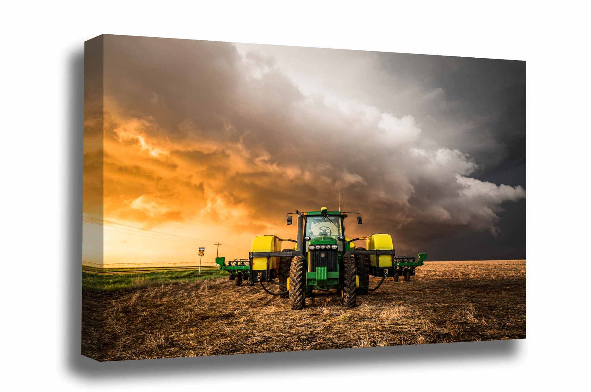 Farm and country gallery wrapped canvas wall art of a tractor and storm at sunset on a stormy spring evening in Kansas by Sean Ramsey of Southern Plains Photography.