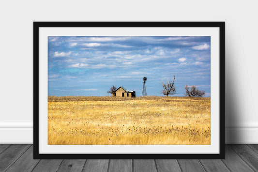 Framed and matted country print of an abandoned homestead and old windmill on a rise in a field of golden prairie grass on a winter day in Oklahoma by Sean Ramsey of Southern Plains Photography. 