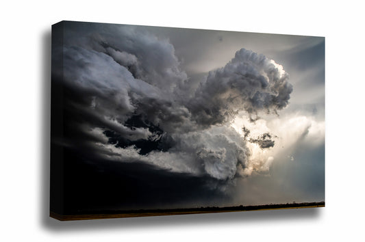 Supercell thunderstorm Canvas wall art of a storm cloud shaped like a fist on a stormy spring day on the plains of Oklahoma by Sean Ramsey of Southern Plains Photography.