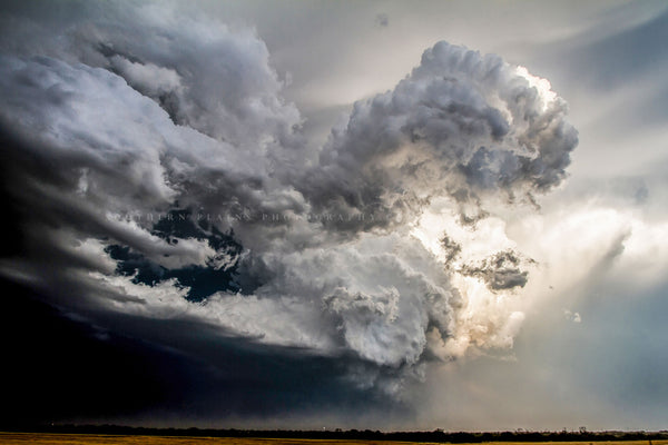 Supercell thunderstorm photography print of a storm cloud shaped like a fist packing a powerful punch on a spring day over the plains of Oklahoma by Sean Ramsey of Southern Plains Photography.