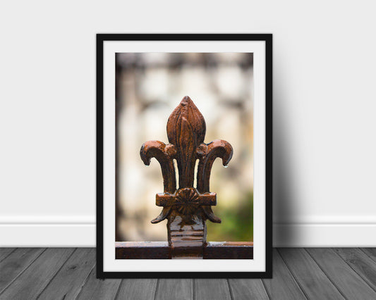 Vertical framed and matted French Quarter print of a wrought iron Fleur de Lis in New Orleans, Louisiana by Sean Ramsey of Southern Plains Photography.