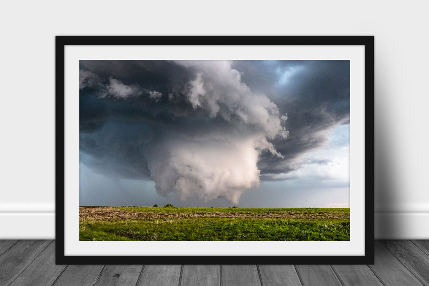 Framed and matted supercell thunderstorm print of a wall cloud under a mesocyclone reaching for ground level on a stormy spring day on the plains of the Oklahoma panhandle by Sean Ramsey of Southern Plains Photography.