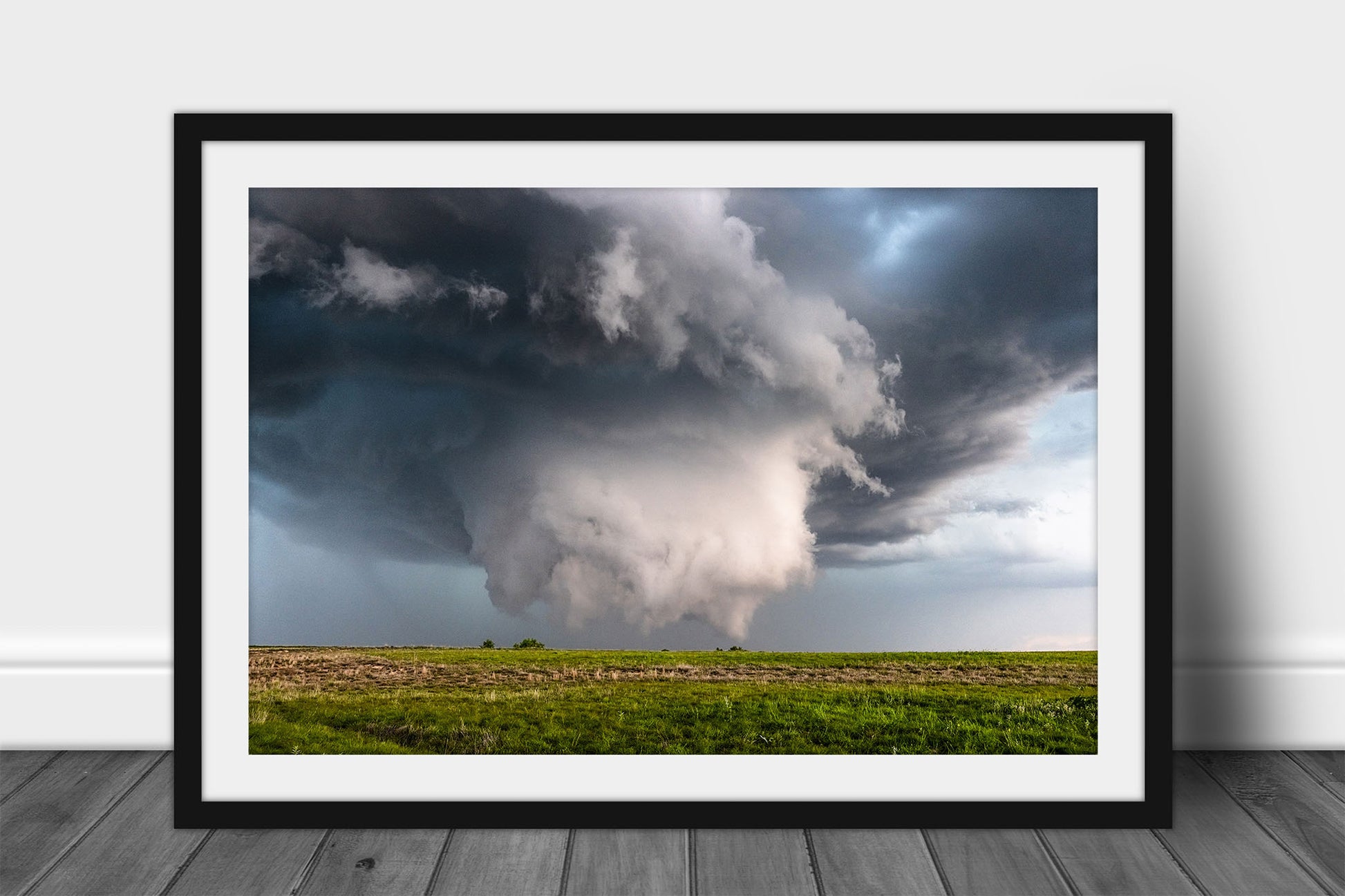 Framed and matted supercell thunderstorm print of a wall cloud under a mesocyclone reaching for ground level on a stormy spring day on the plains of the Oklahoma panhandle by Sean Ramsey of Southern Plains Photography.