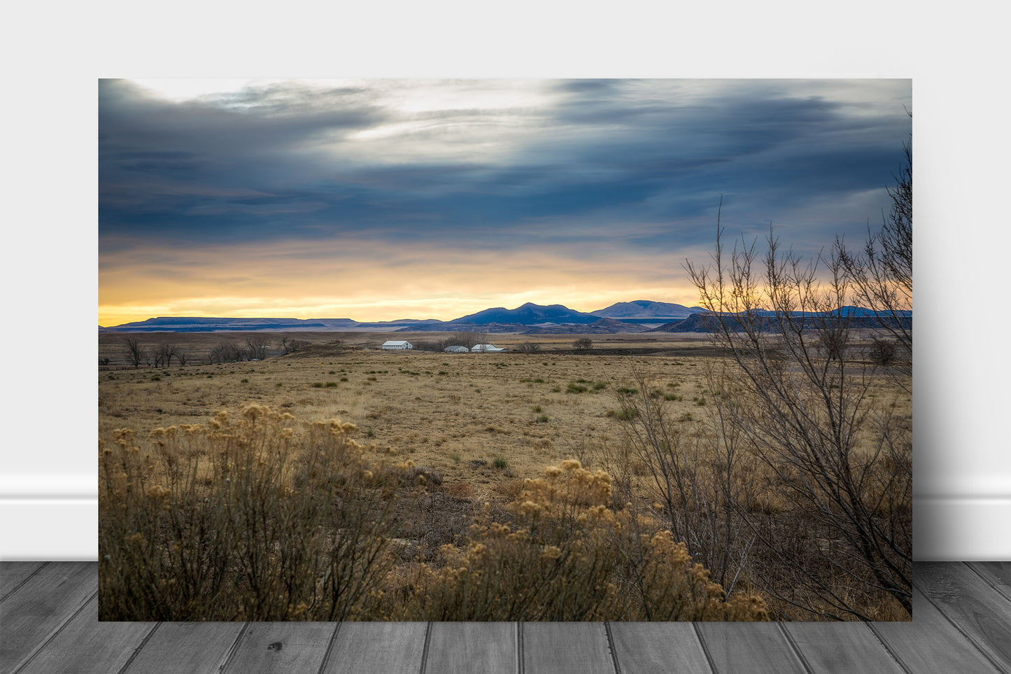 Rocky Mountains aluminum metal print wall art of warm sunlight casting a glow over a valley on a winter morning near Raton, New Mexico by Sean Ramsey of Southern Plains Photography.