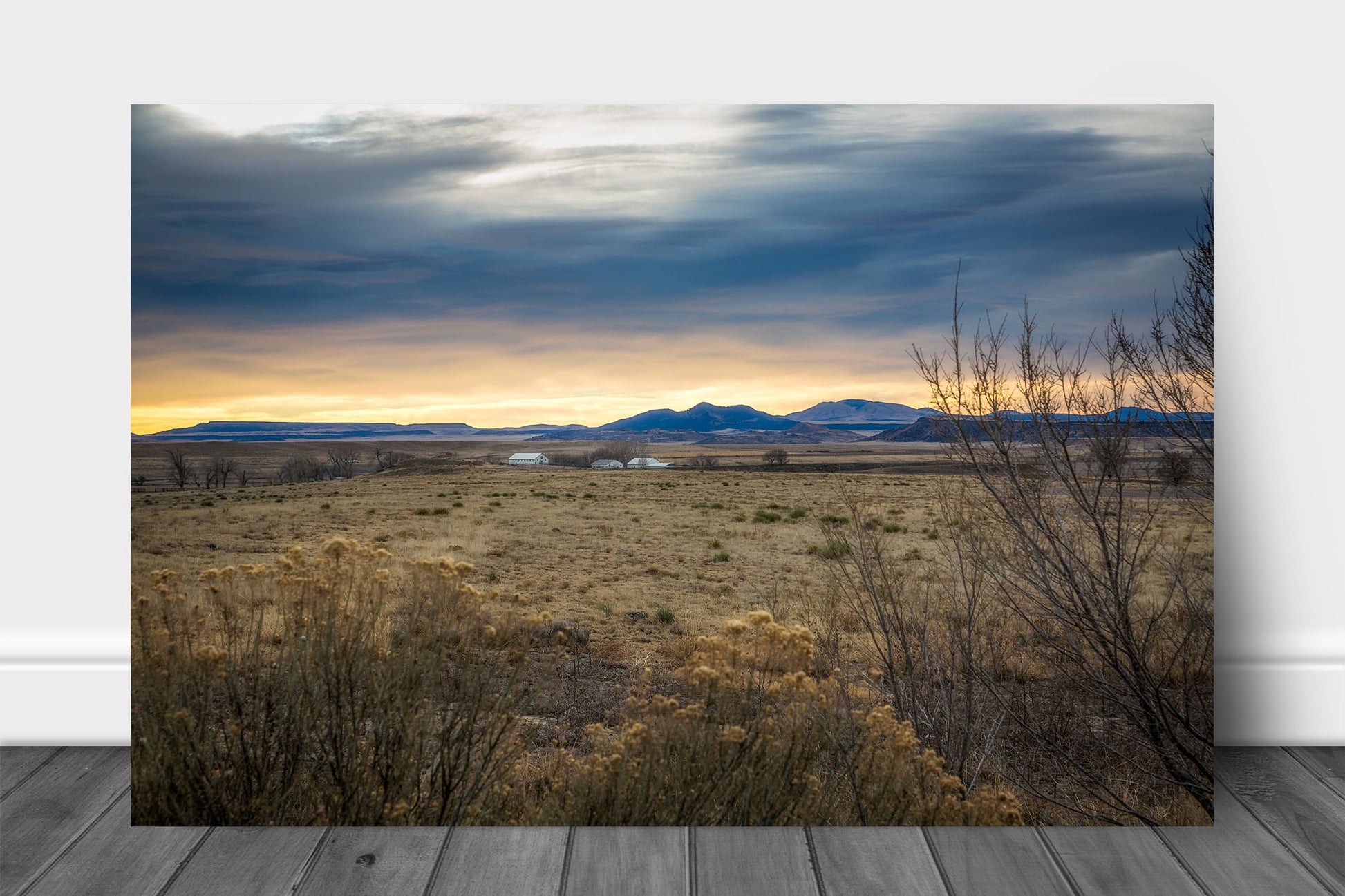 Rocky Mountains aluminum metal print wall art of warm sunlight casting a glow over a valley on a winter morning near Raton, New Mexico by Sean Ramsey of Southern Plains Photography.