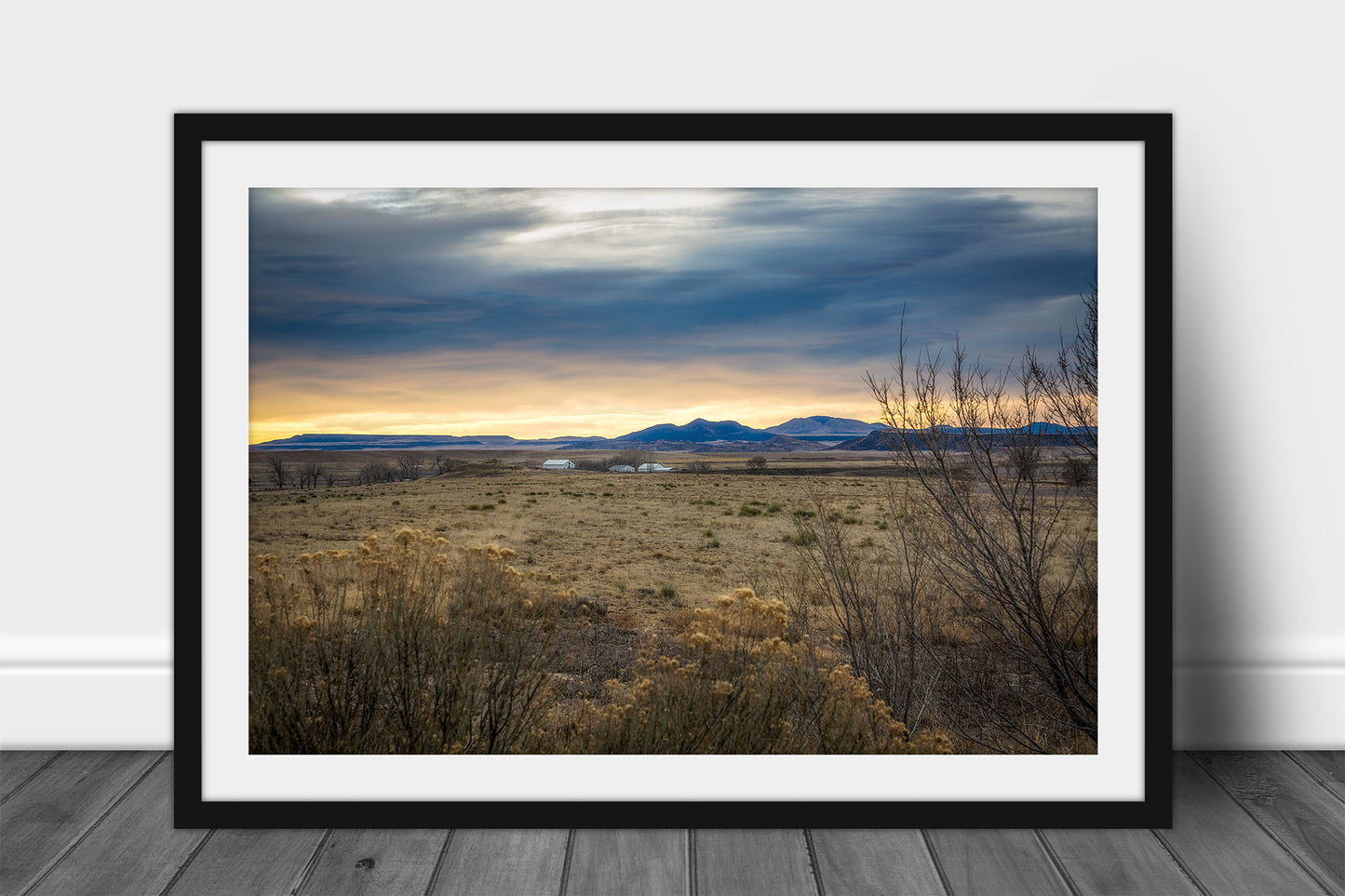 Rocky Mountains framed print of warm sunlight casting a glow over a valley on a winter morning near Raton, New Mexico by Sean Ramsey of Southern Plains Photography.