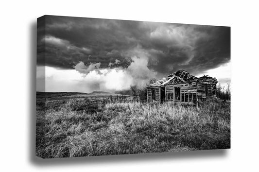 Black and white country gallery wrapped canvas wall art of an abandoned house and passing storm on a spring day on the Kansas prairie by Sean Ramsey of Southern Plains Photography.