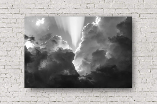 Black and white celestial metal print of sunbeams bursting from storm clouds on a stormy spring day in Oklahoma by Sean Ramsey of Southern Plains Photography.