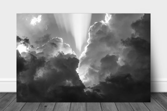 Black and white celestial metal print of sunbeams bursting from storm clouds on a stormy spring day in Oklahoma by Sean Ramsey of Southern Plains Photography.