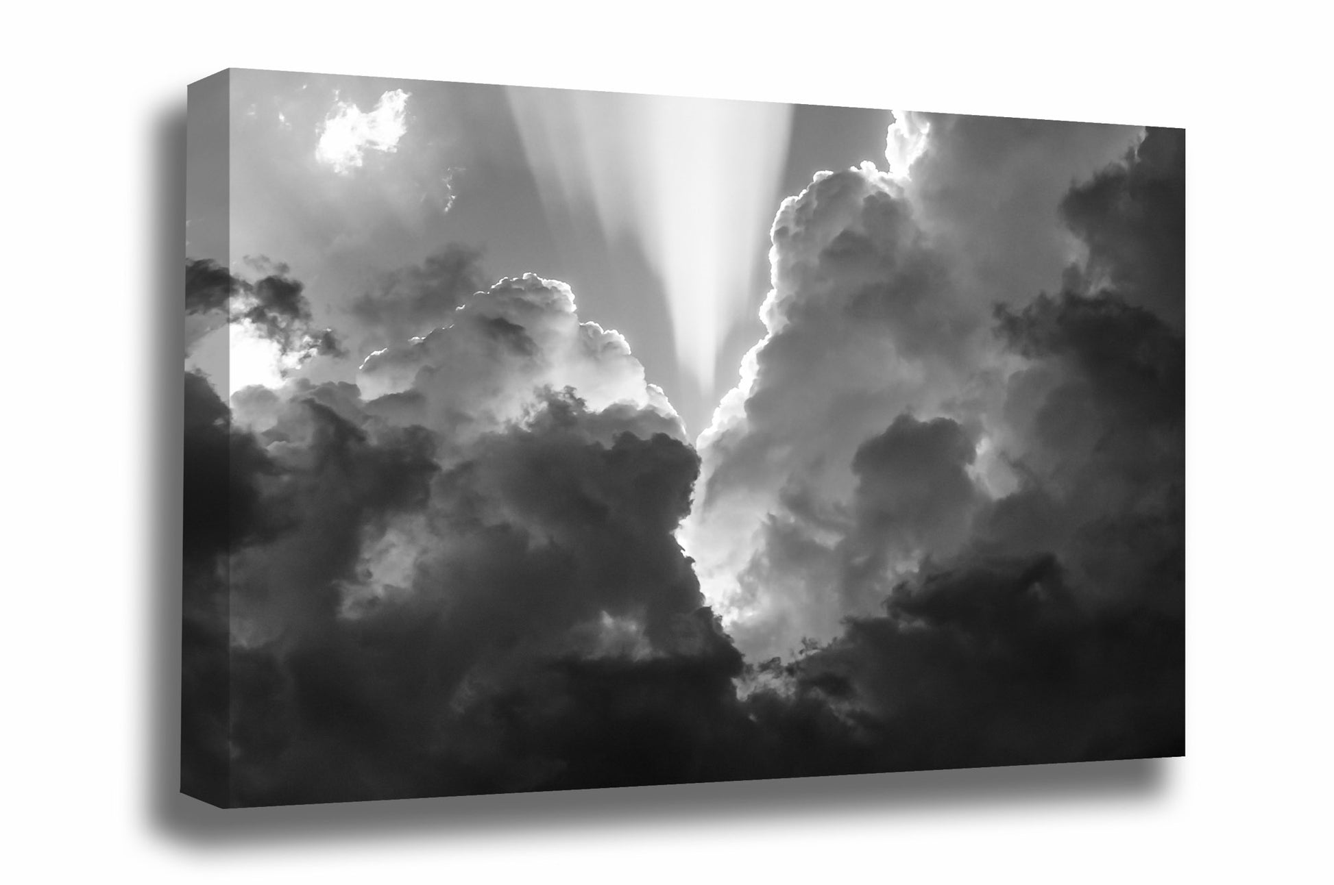 Inspirational canvas wall art of sunlight bursting from behind storm clouds on a spring day in Oklahoma in black and white by Sean Ramsey of Southern Plains Photography.