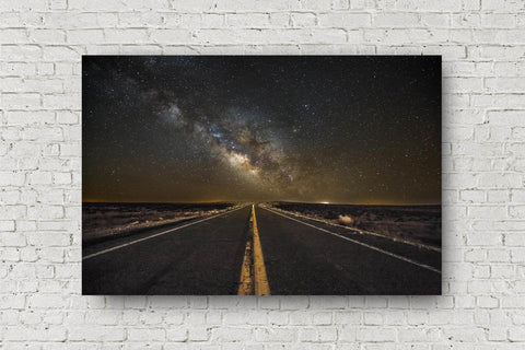 Celestial metal print of a highway leading to the Milky Way as it rises on the horizon on a starry night in the Arizona desert by Sean Ramsey of Southern Plains Photography.