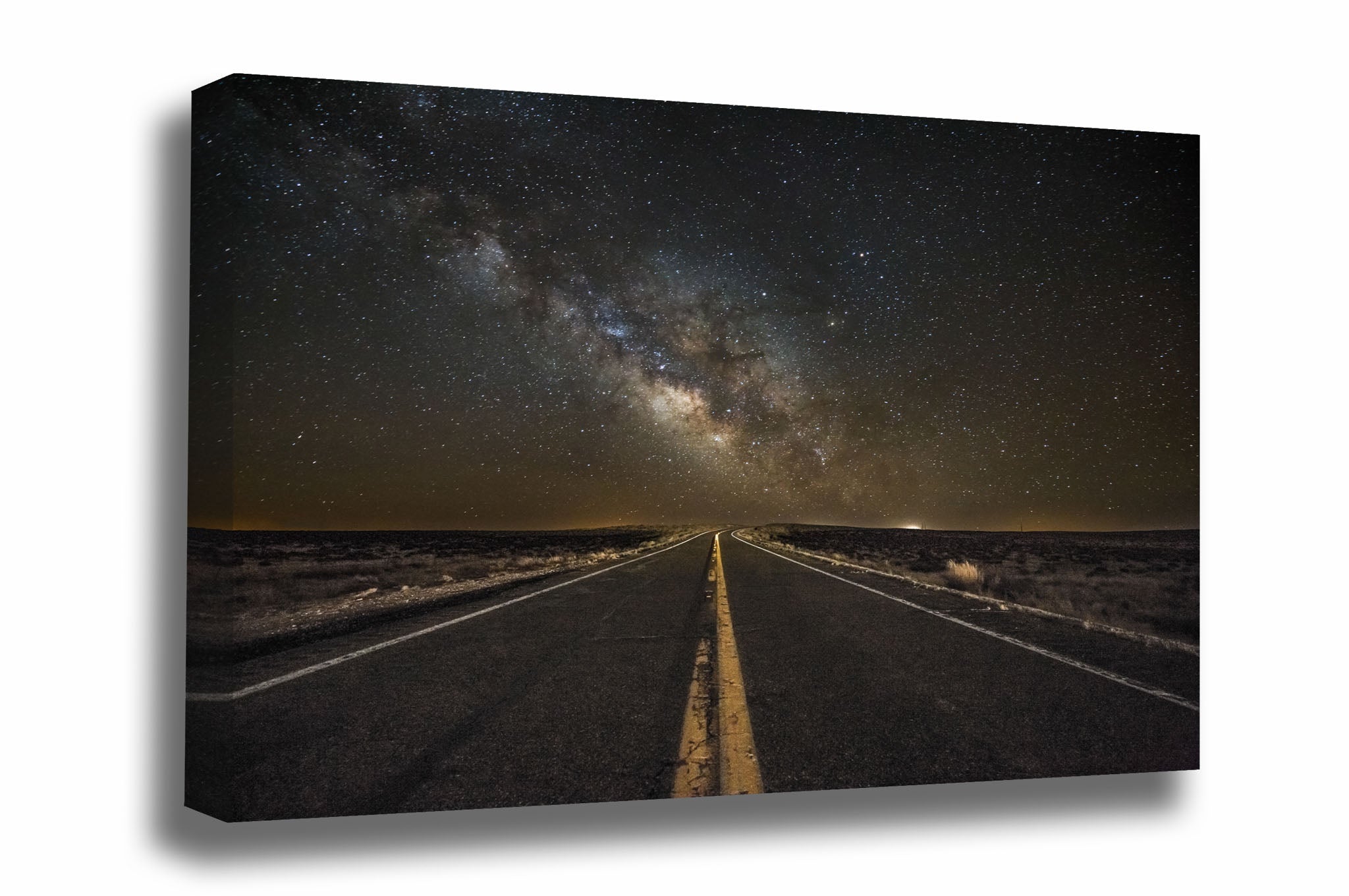 Wanderlust canvas wall art of a highway leading to the Milky Way rising above the horizon in the Arizona night sky by Sean Ramsey of Southern Plains Photography.