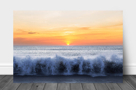 Coastal aluminum metal print wall art of waves crashing onto a beach as the sun rises over the Atlantic Ocean on the Outer Banks in North Carolina by Sean Ramsey of Southern Plains Photography.