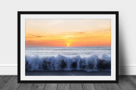 Framed and matted coastal print of waves crashing onto a beach as the sun rises over the Atlantic Ocean on the Outer Banks in North Carolina by Sean Ramsey of Southern Plains Photography.